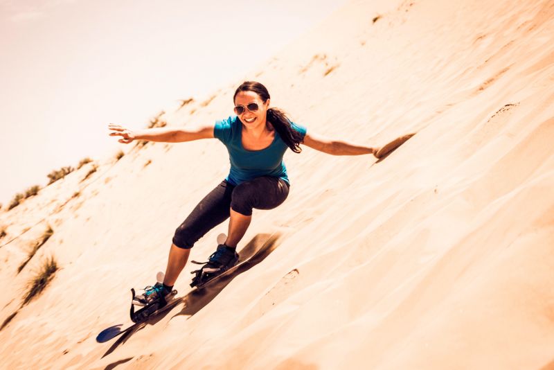 Sand boarding in Dubai desert